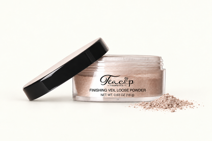 Teacup Cosmetics Finishing Veil Loose Powder shade 110 Silver Pearl with front-right loose powder spill
