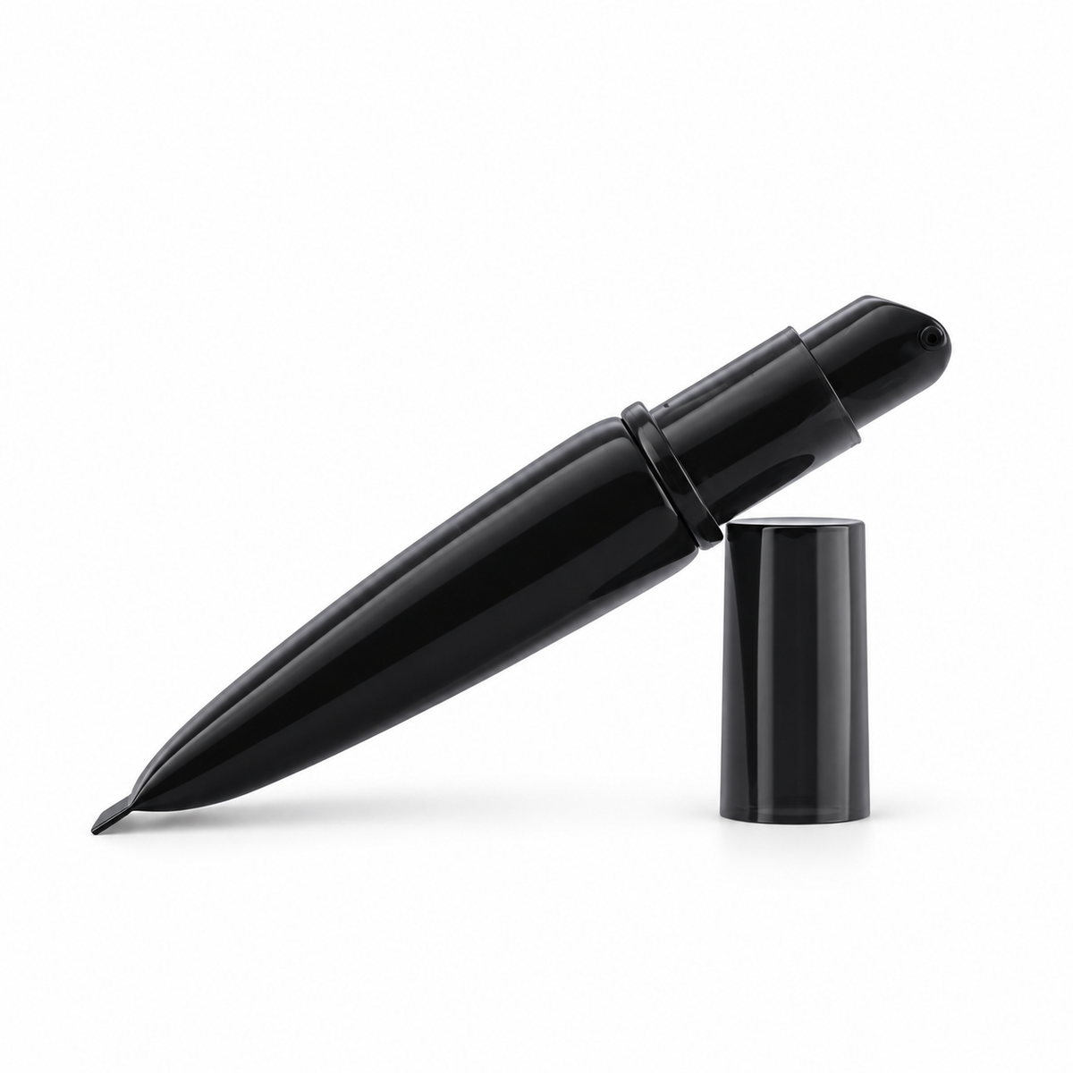 Velvet Matte Foundation black tube with its small pump exposed and cap beside it